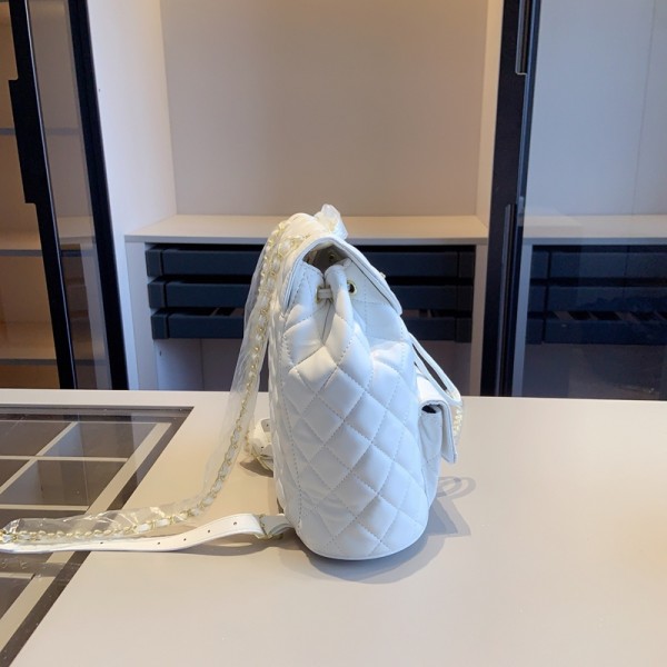 Chanel シャネルブランド皮革リュック 財布2点セット レディース 小さめ  気質リュック 大容量 軽量 可愛い 通勤 通学 旅行 カジュアル 多機能 プレゼント 女の子 女性 ビジネス ドールペンダント