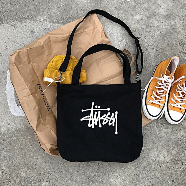 Stussy ステューシーブランドキャンバスバッグ ショルダーバッグ 大容量 トートバック 一泊旅行 キャンバストート エコバッグ 帆布 肩掛け トート ショッピングバッグ シンプル ファスナー付き レディース メンズ 