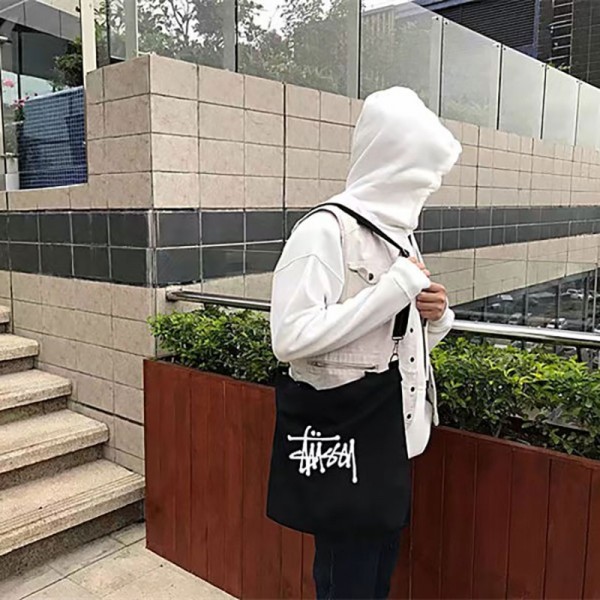 Stussy ステューシーブランドキャンバスバッグ ショルダーバッグ 大容量 トートバック 一泊旅行 キャンバストート エコバッグ 帆布 肩掛け トート ショッピングバッグ シンプル ファスナー付き レディース メンズ 